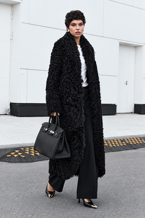 Cappotto lungo in montone nero